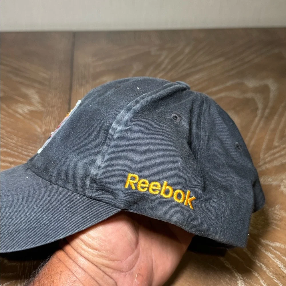 REEBOK PITTSBURG STEELERS STRAPBACK HAT. FADED BLACK NFL TEAM APPAREL ADJUSTABLE